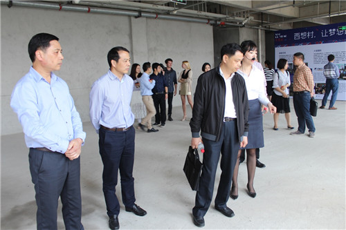 市委组织部副部长陈键一行莅临我集团考察"西联商务中心—西想村